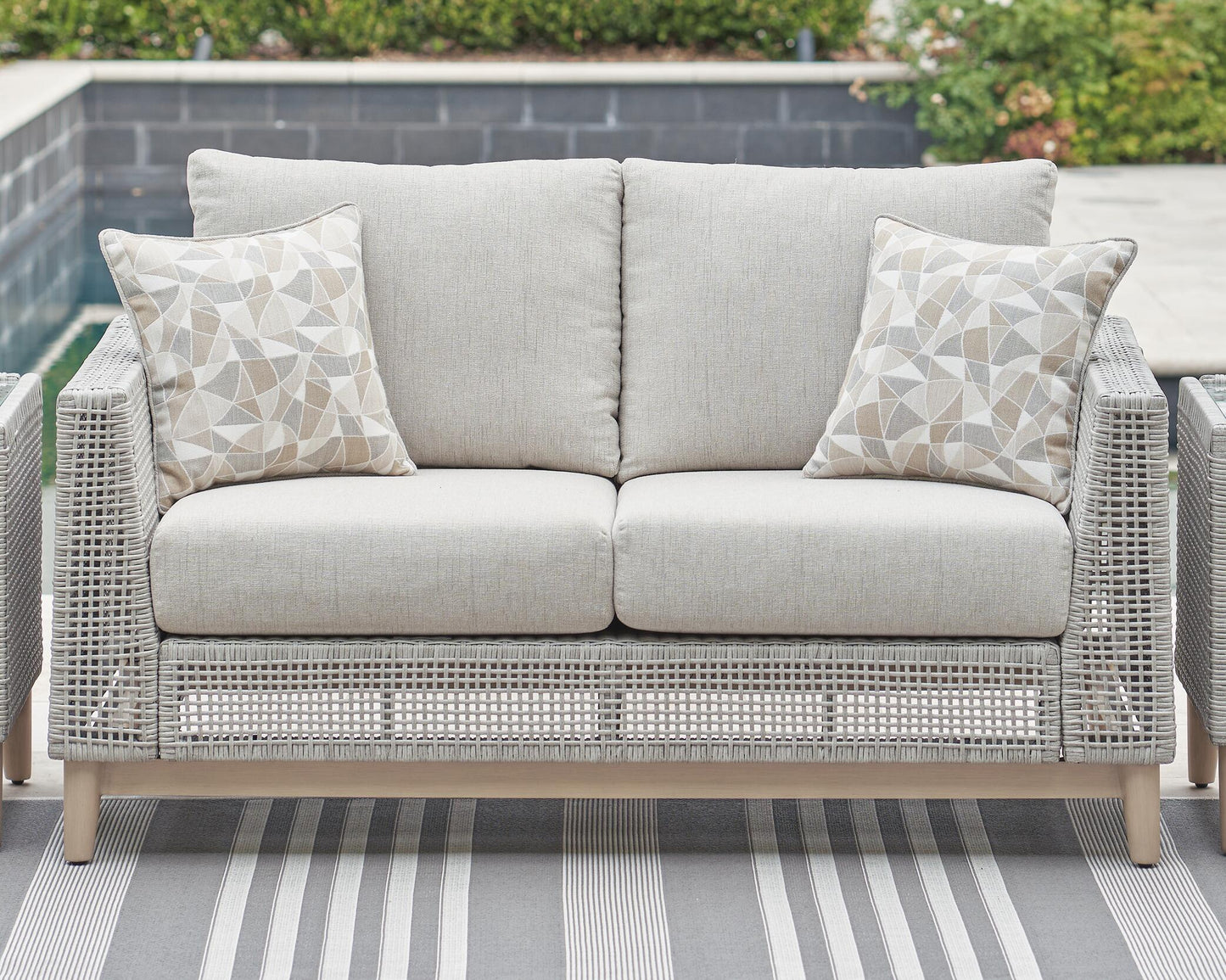 ASHLEY Seton Creek Outdoor Loveseat with Cushion
